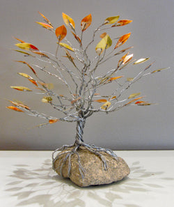 Deeply Rooted Tree with Copper and Brass Leaves