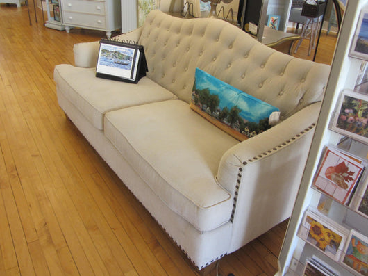 Creme Camel Back Tufted Sofa