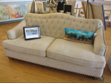 Creme Camel Back Tufted Sofa