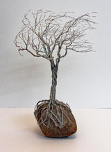 Deeply Rooted Windblown Tree Metal Sculpture